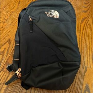 The North Face Black Backpack with Rose Gold Accents